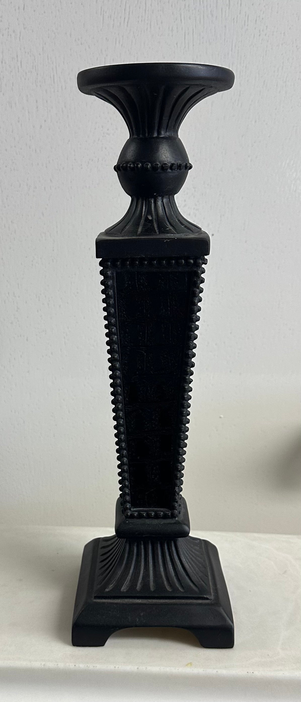 Black Candle Holer